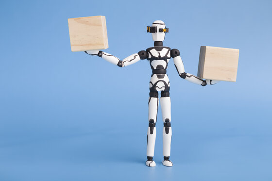 Robot holding two wooden cubes like on scales, comparing variants